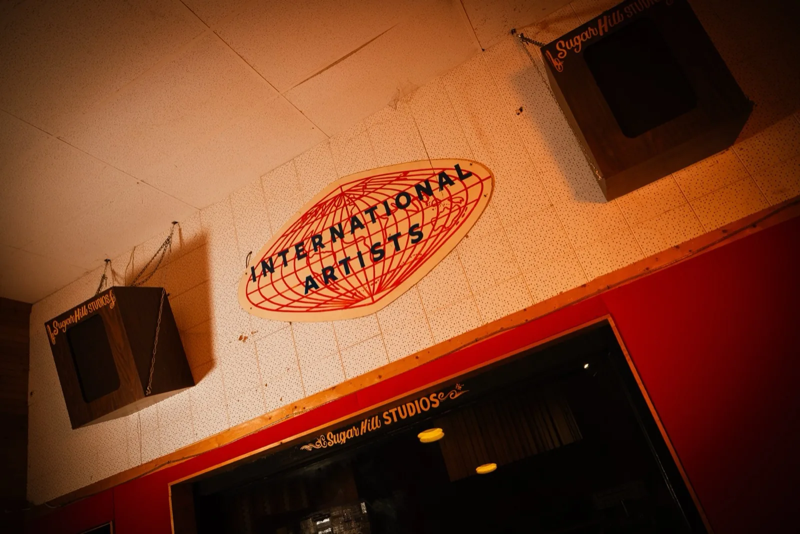 The International Artists globe and Sugar Hill Studios signage inside the studio